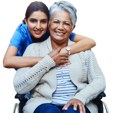 caregiver hugging elderly in wheelchair