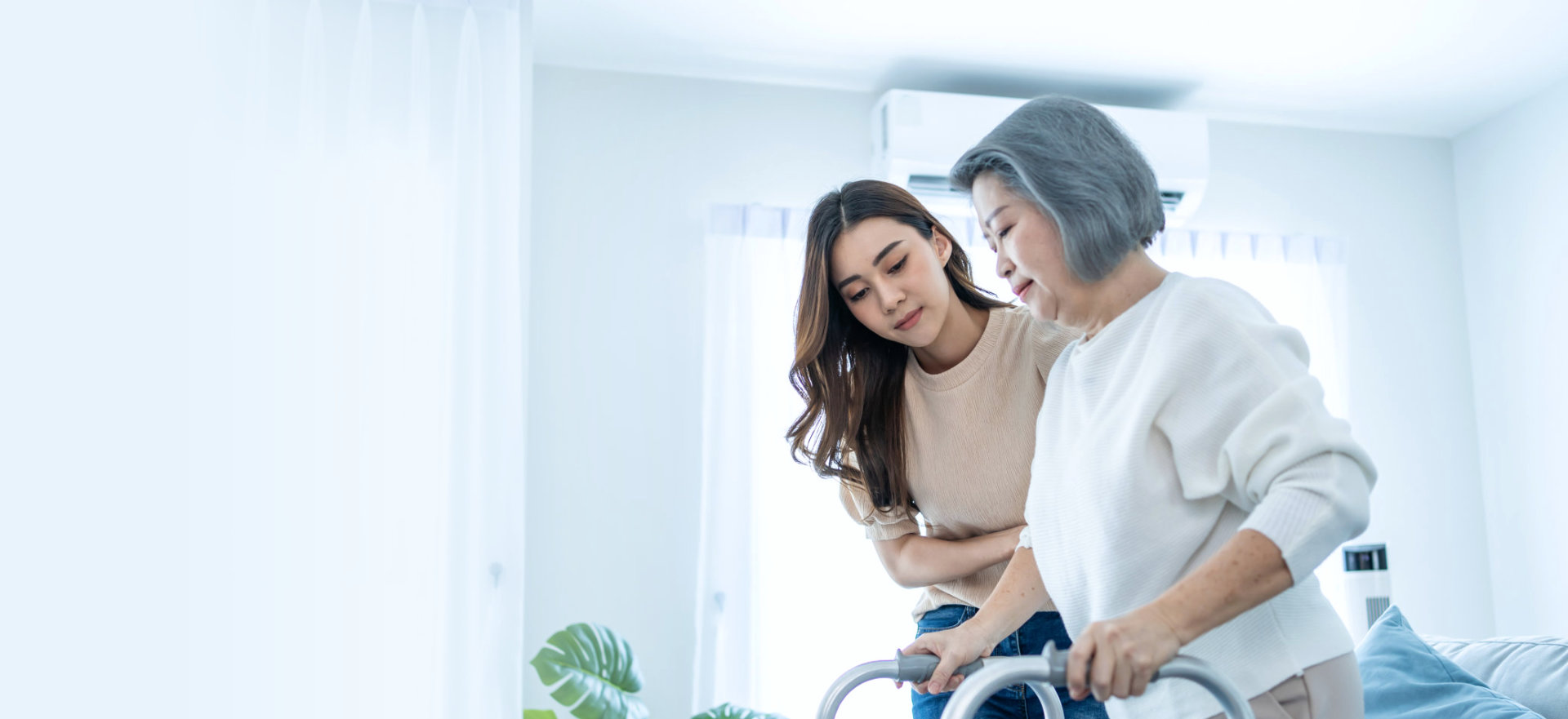 elderly holding crane while walking